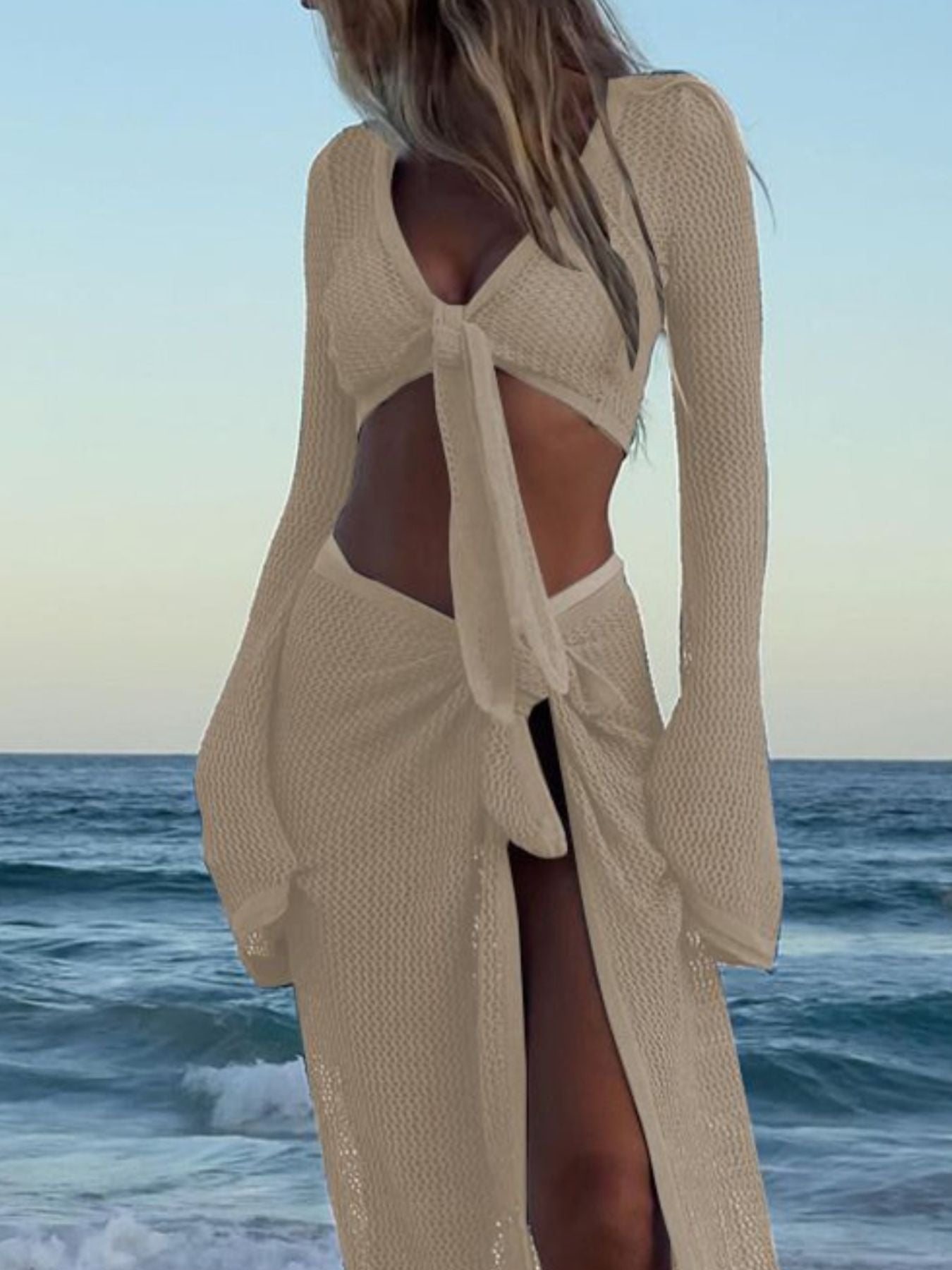 Crochet Knit Long Sleeve Crop Top and Slit Skirt Sweater Set Trendsi