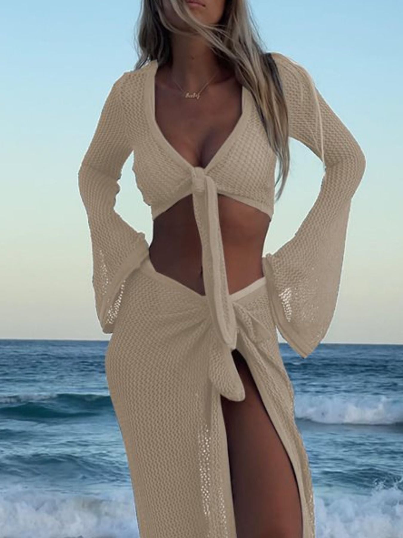 Crochet Knit Long Sleeve Crop Top and Slit Skirt Sweater Set Trendsi