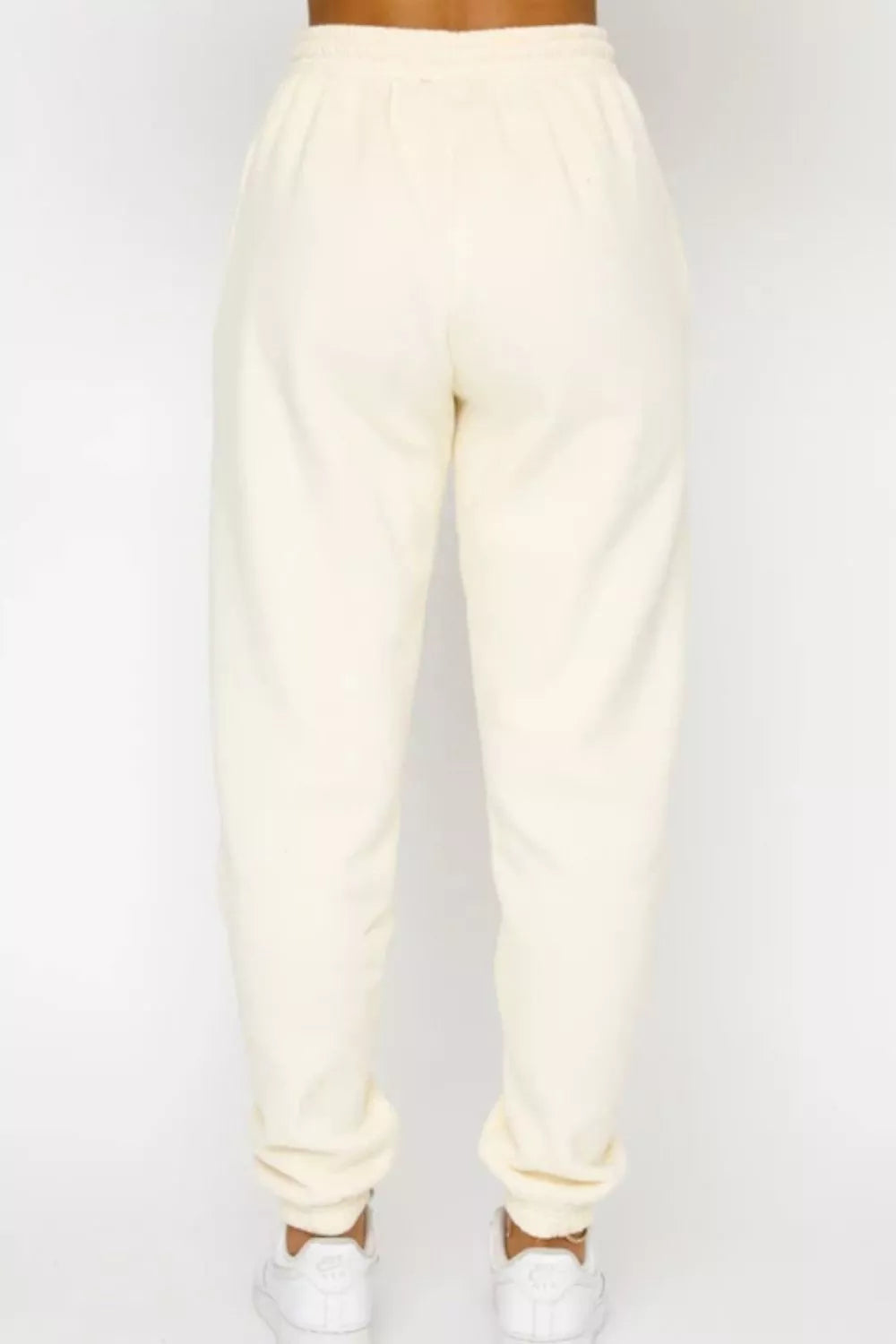 Round Neck Sweatshirt and Joggers Set Trendsi