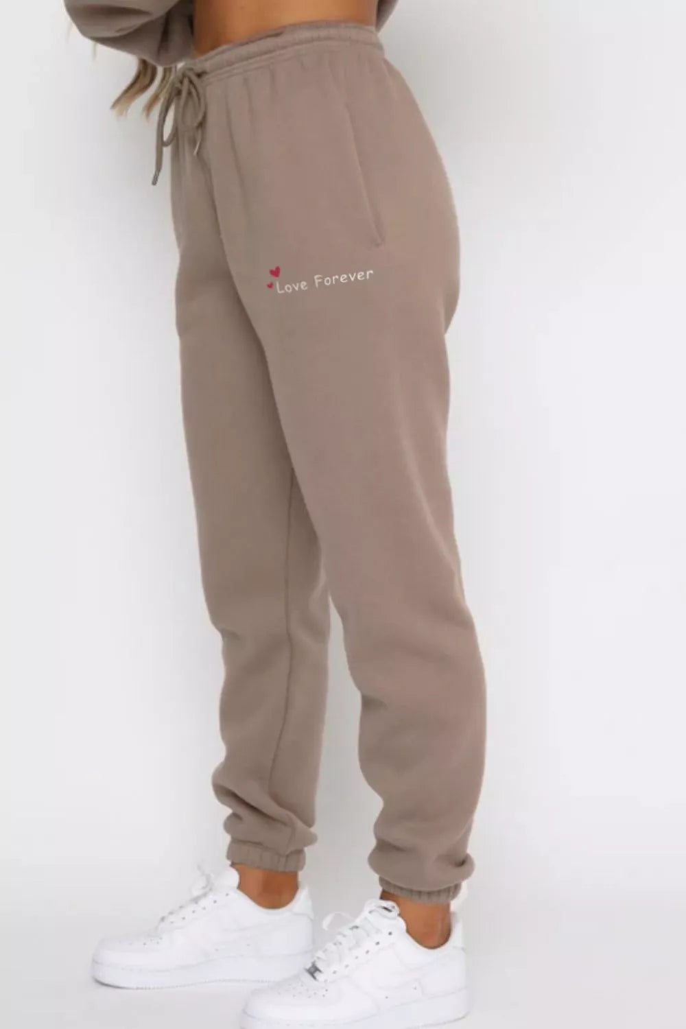 Round Neck Sweatshirt and Joggers Set Trendsi