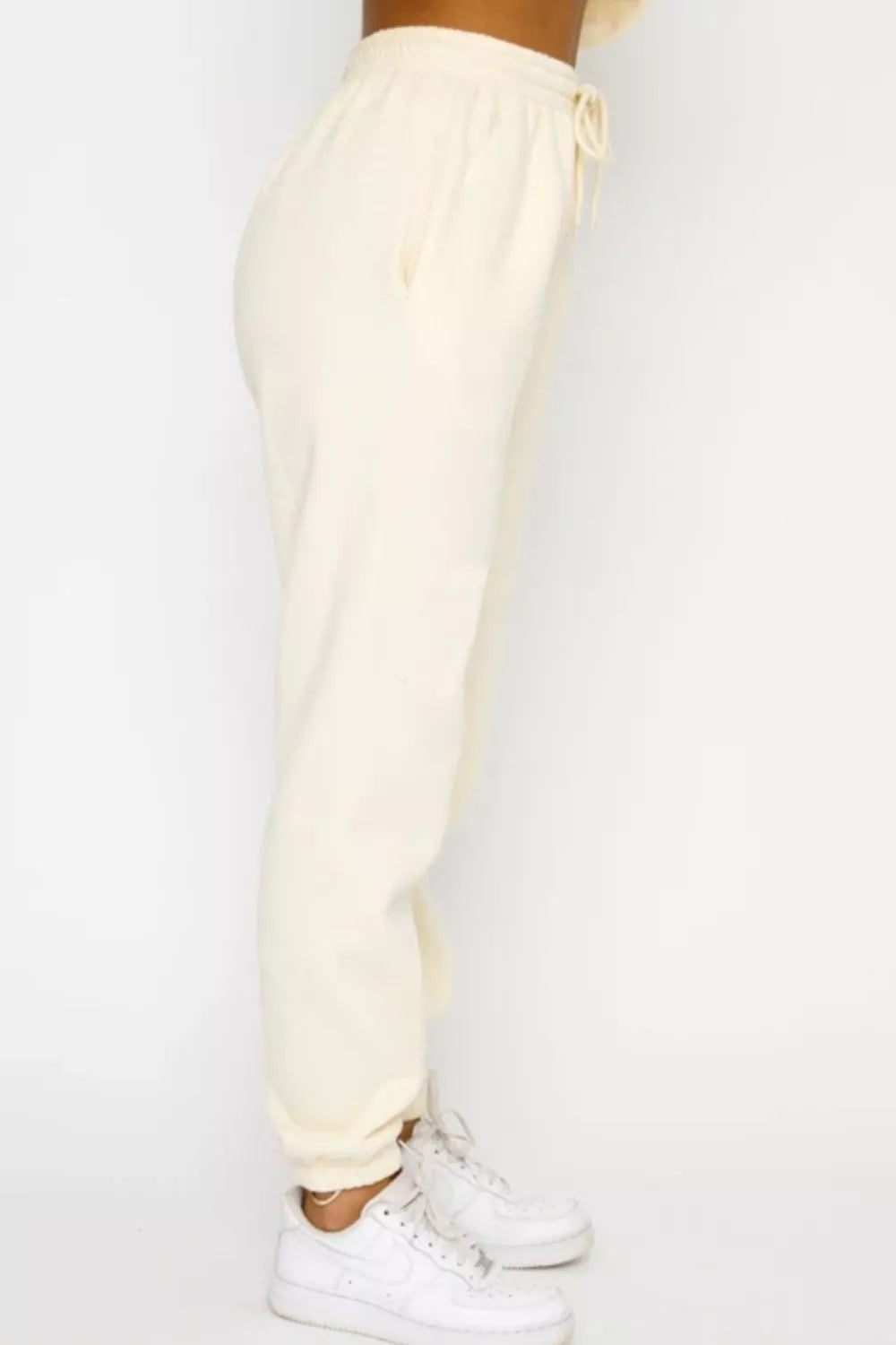 Round Neck Sweatshirt and Joggers Set Trendsi