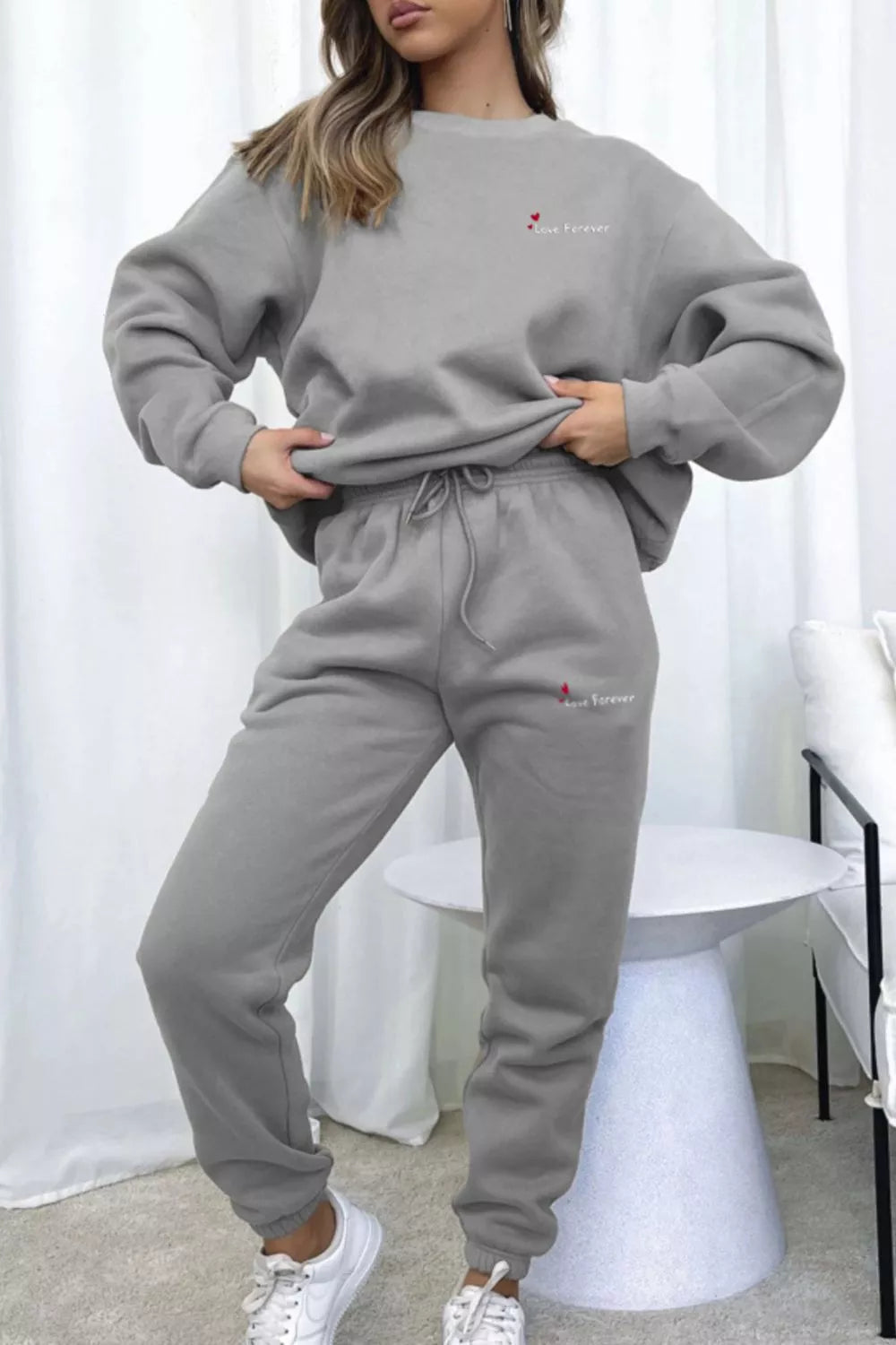 Round Neck Sweatshirt and Joggers Set Trendsi