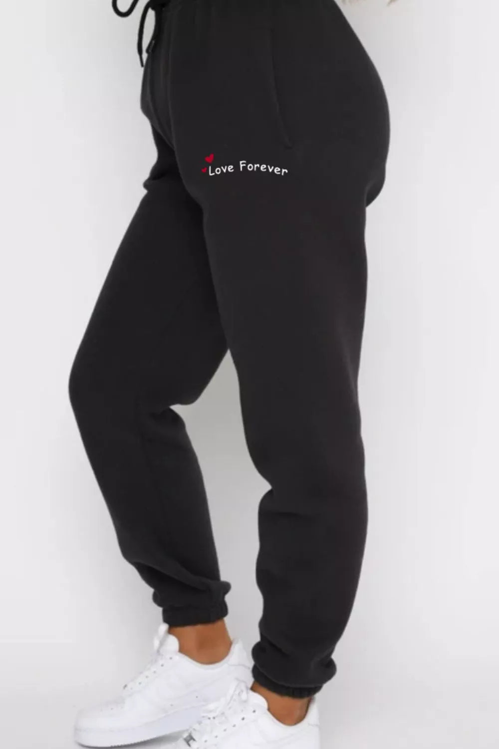 Round Neck Sweatshirt and Joggers Set Trendsi